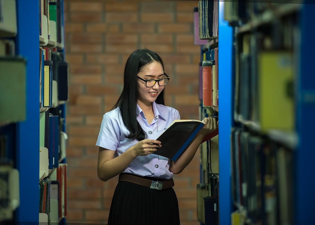 Asian student in a US university library